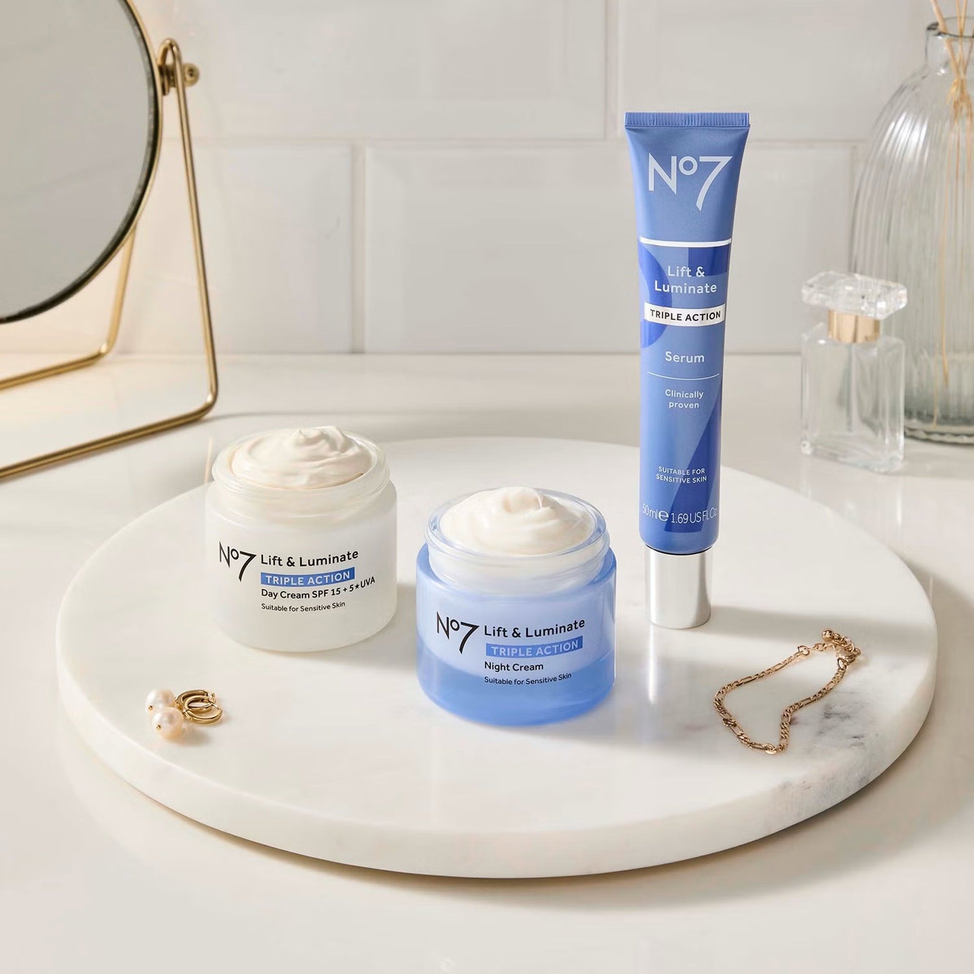 No7 skincare products on a marble tray with a mirror in the background