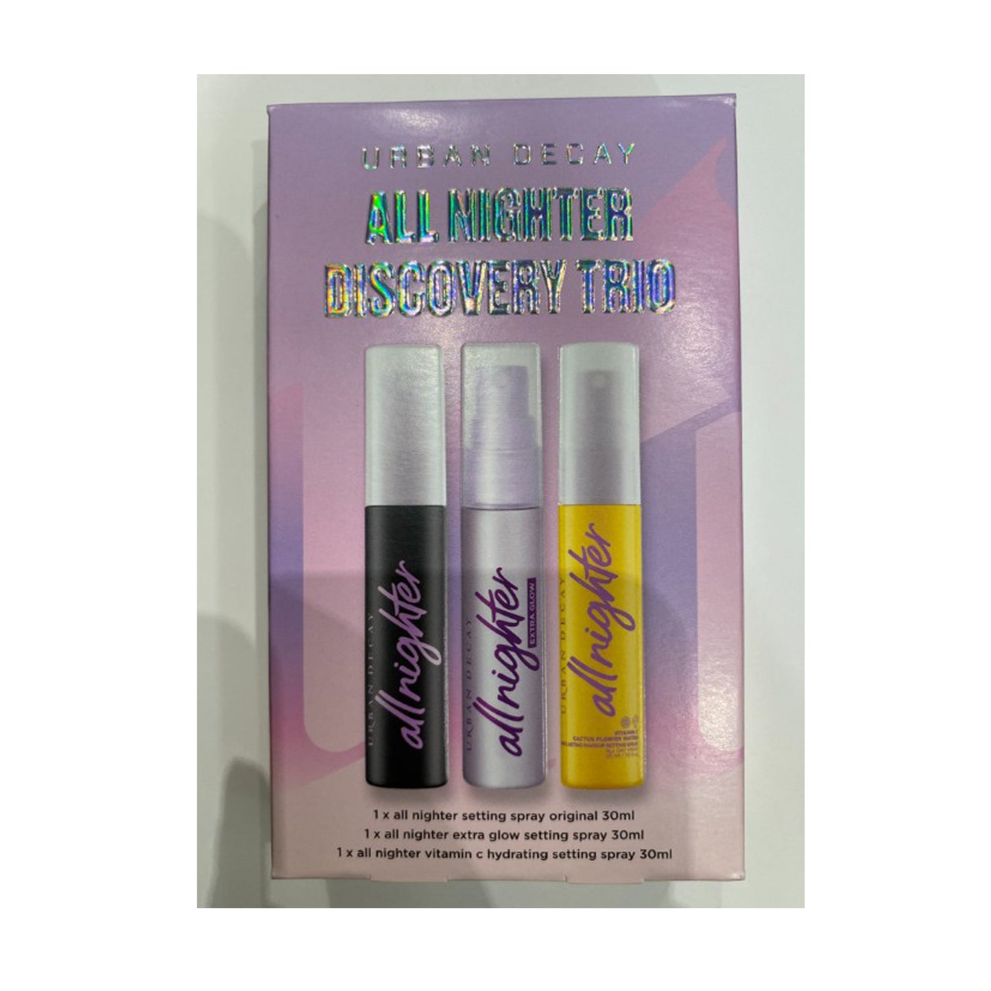 Urban Decay All Nighter Discovery Trio packaging with three bottles on a white background