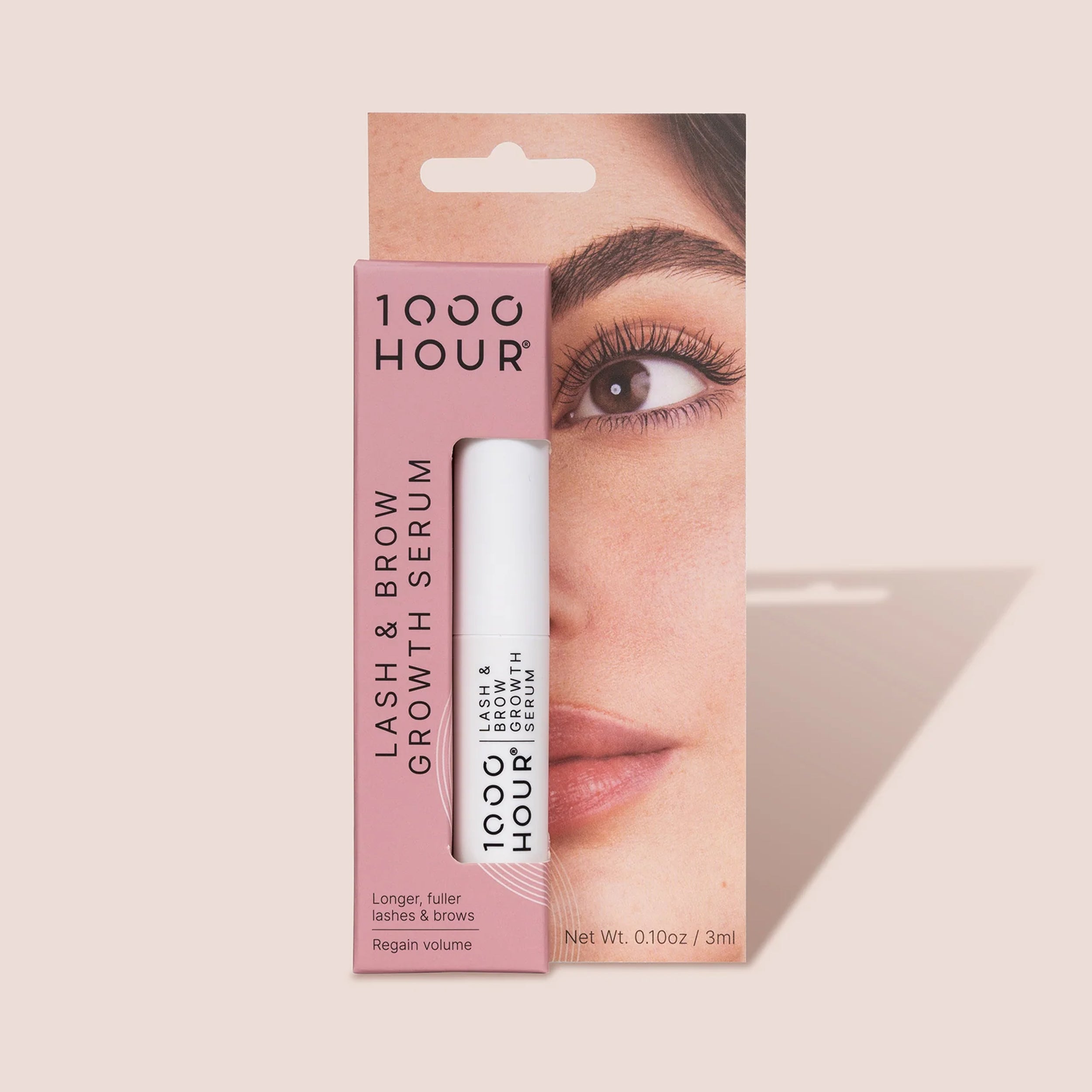1000 Hour lash and brow growth serum packaging with a close-up of an eye.