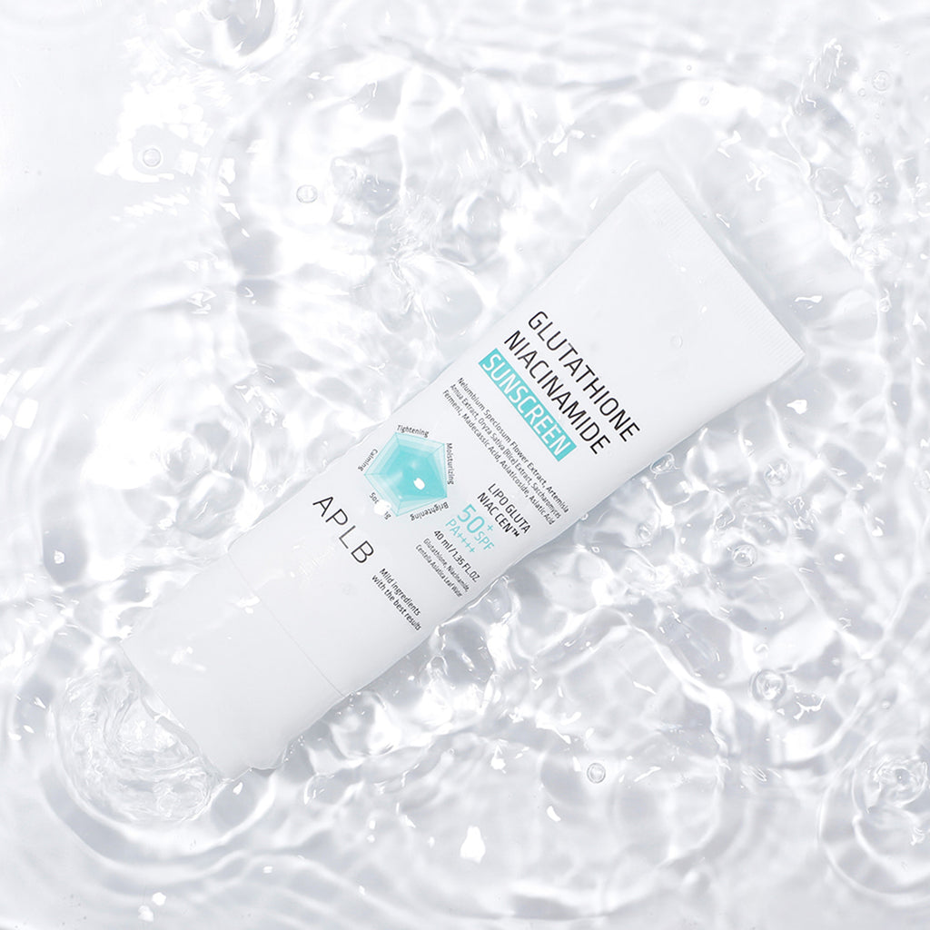 Skincare product with 'APLB' branding on a textured white background