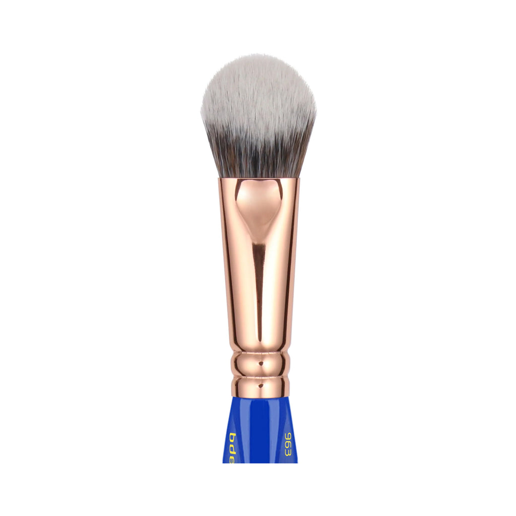 Makeup brush with rose gold handle and blue ferrule on a white background