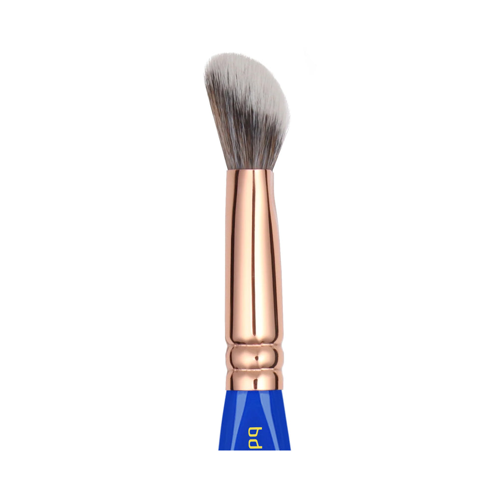 Makeup brush with rose gold handle and blue ferrule on a white background
