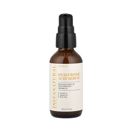 Hyaluronic acid serum bottle with black cap on a white background