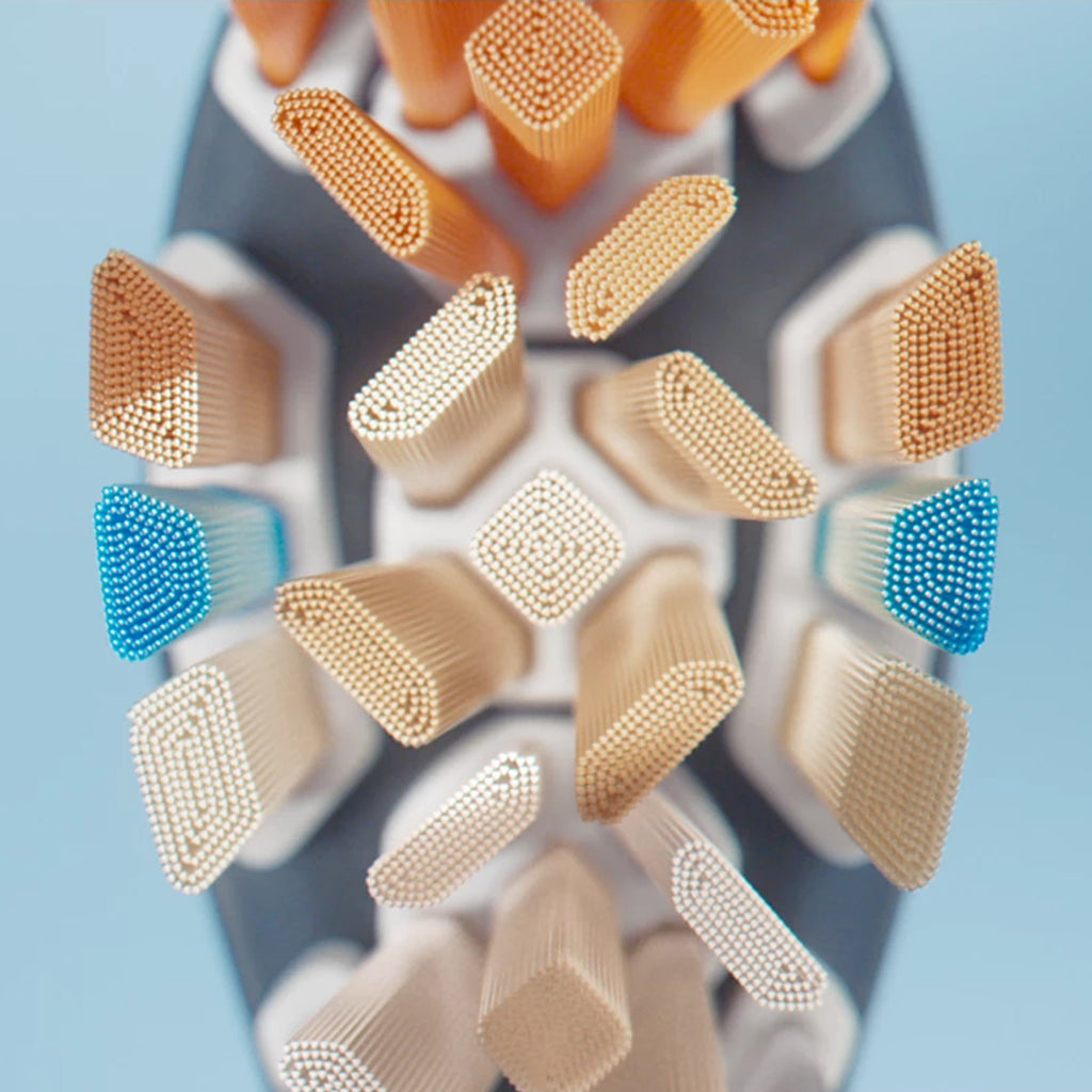 Close-up of a shoe sole with textured pattern on a light blue background